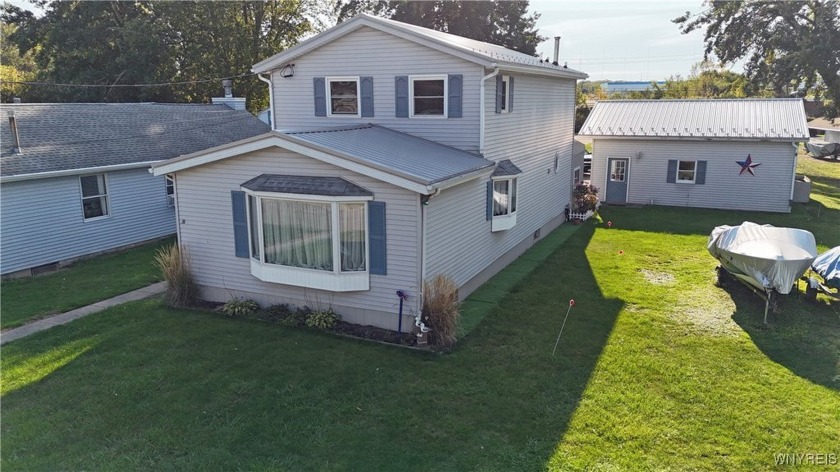 Welcome home on the beautiful shores of Lake Erie! This property - Beach Home for sale in Hamburg, New York on Beachhouse.com