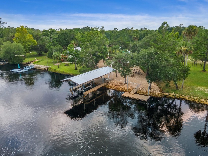 This absolutely stunning riverfront home built in 2000 on 0.88 - Beach Home for sale in Steinhatchee, Florida on Beachhouse.com