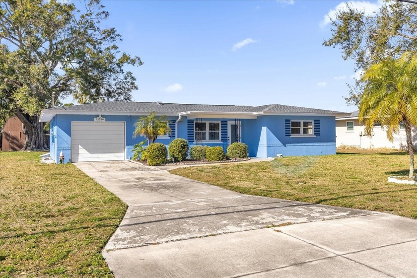 Welcome to this beautifully renovated 1957 block home, perfectly - Beach Home for sale in Largo, Florida on Beachhouse.com