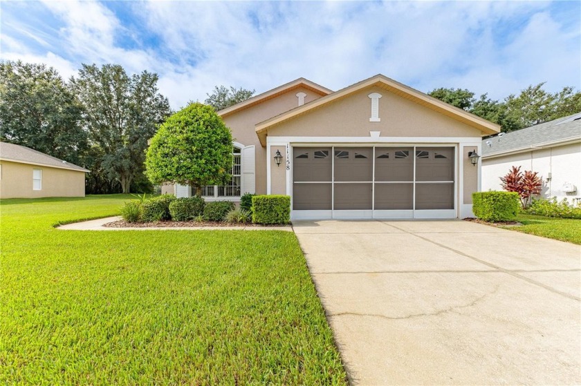 A View with a Home, This incredible 2/2 PLUS Den situated on - Beach Home for sale in Spring Hill, Florida on Beachhouse.com