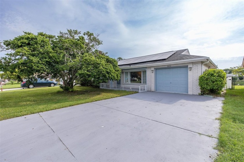 Welcome to your waterfront oasis! This cozy home features 2 - Beach Home for sale in Holiday, Florida on Beachhouse.com