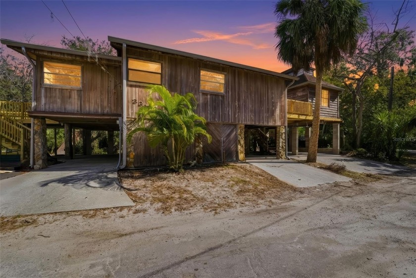 SELLER FINANCING AVAILABLE! This home on concrete pillars, on - Beach Home for sale in New Port Richey, Florida on Beachhouse.com