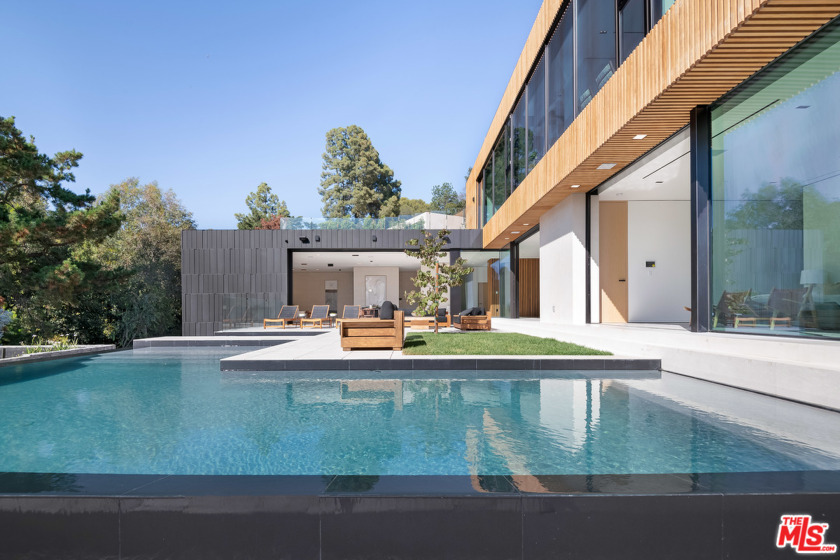 A stunning modern architectural gem with a prestigious 90210 - Beach Home for sale in Beverly Hills, California on Beachhouse.com