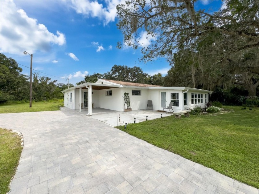 You simply must experience this one of a kind property to truly - Beach Home for sale in New Port Richey, Florida on Beachhouse.com