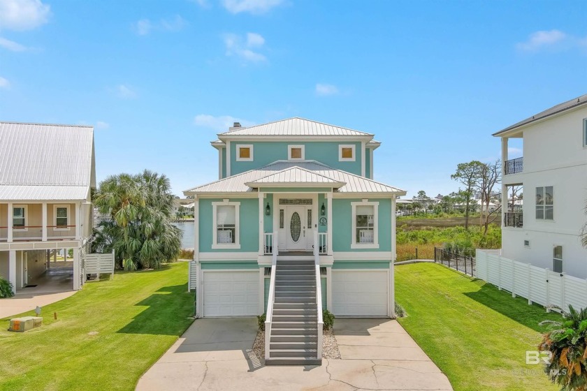 This luxurious 3,698 sq/ft custom home offers a stunning, open - Beach Home for sale in Orange Beach, Alabama on Beachhouse.com