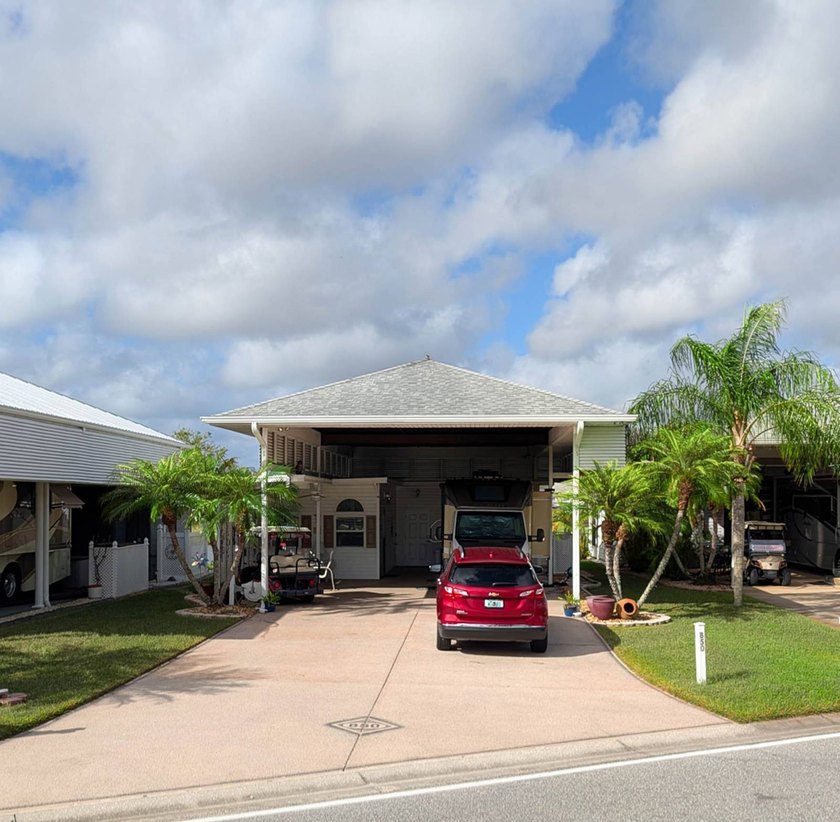 The port cover measures 23'x47'x13' high with a furnished - Beach Lot for sale in Titusville, Florida on Beachhouse.com