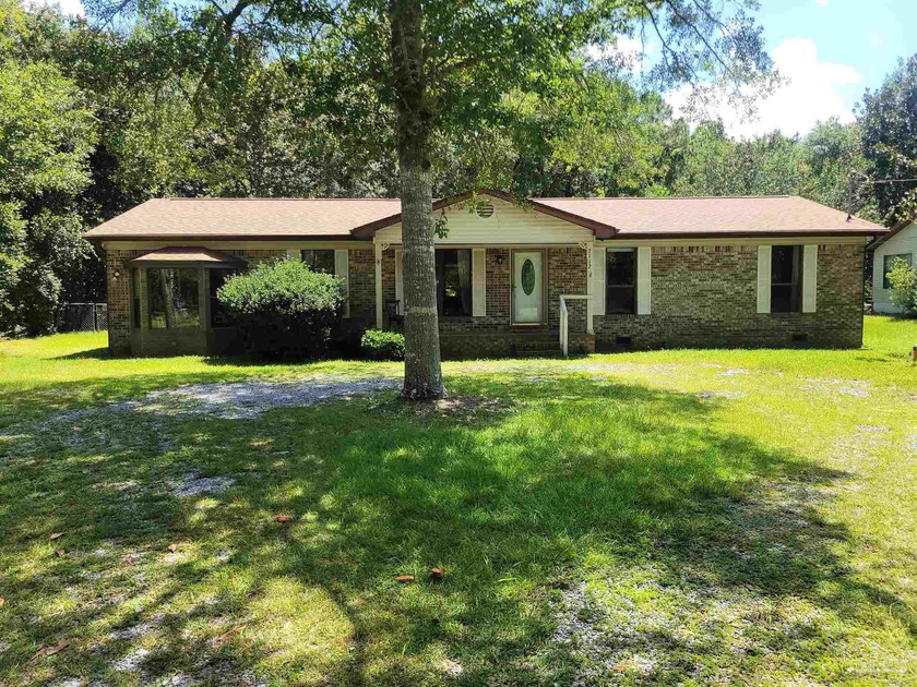 Classic 3/2 brick home at the end of a quiet street that runs - Beach Home for sale in Navarre, Florida on Beachhouse.com