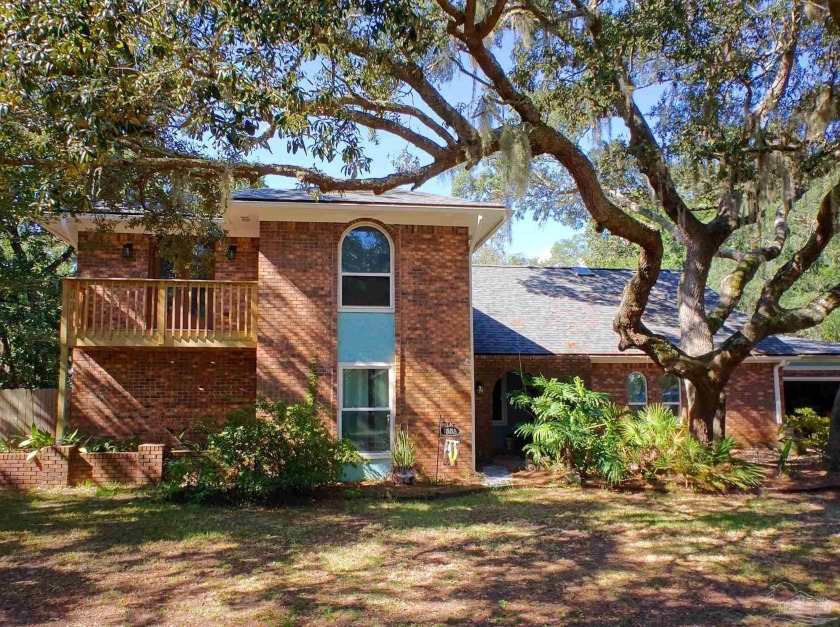 Discover charm and elegance in this 4-bedroom, 3-bathroom Gulf - Beach Home for sale in Gulf Breeze, Florida on Beachhouse.com