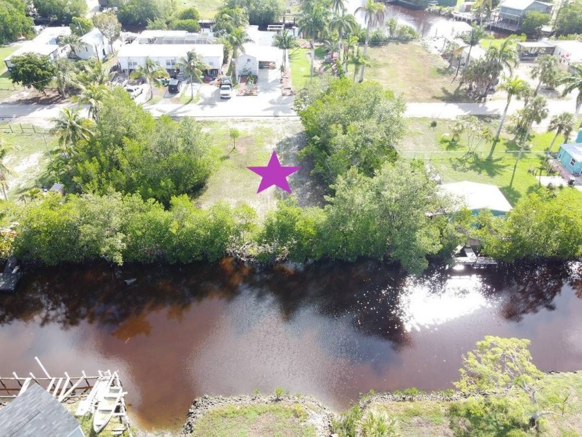 Canal front lot. Fishermans dream! Quick and easy access out to - Beach Lot for sale in Plantation Island, Florida on Beachhouse.com