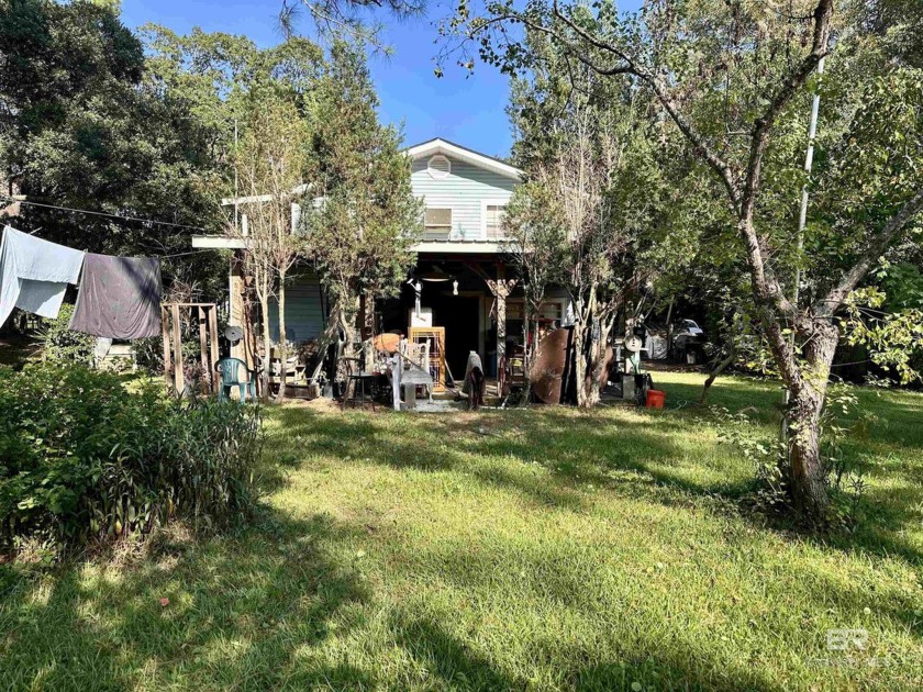 WATERFRONT COTTAGE ON NOLTE CREEK.  This gorgeous property will - Beach Home for sale in Foley, Alabama on Beachhouse.com