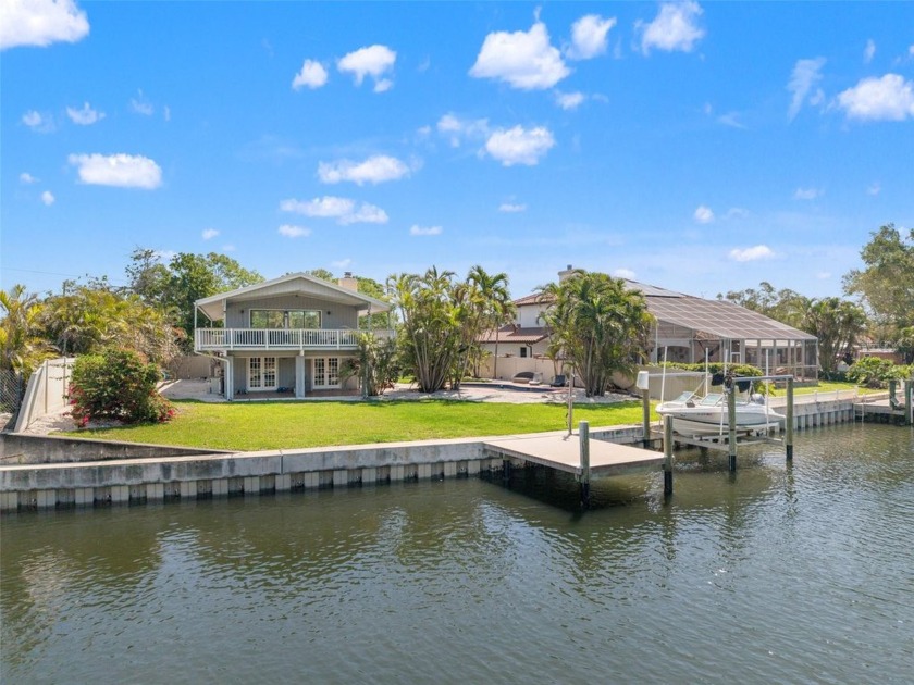 Welcome to your own slice of paradise on Coquina Key! Situated - Beach Home for sale in St. Petersburg, Florida on Beachhouse.com
