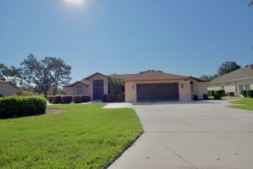 GOLF COURSE HOME ON A DOUBLE LOT in the sought-after gated - Beach Home for sale in Weeki Wachee, Florida on Beachhouse.com