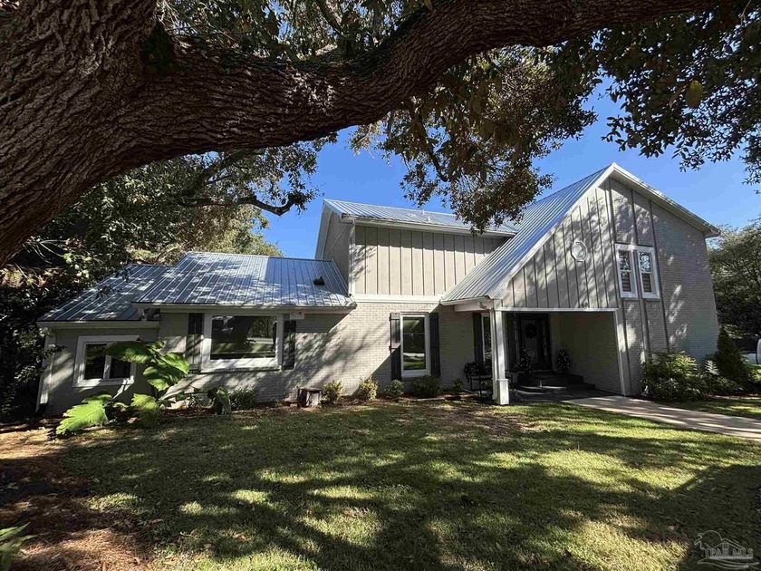 Welcome to this beautifully updated 5-bedroom, 3.5-bath home - Beach Home for sale in Gulf Breeze, Florida on Beachhouse.com