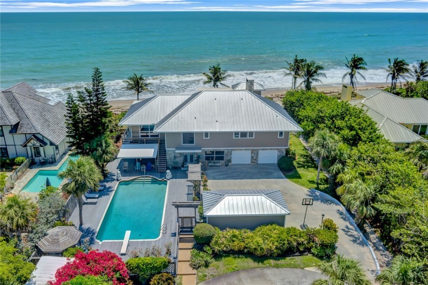 Stunning beachfront home! Surrounded by mature tropical foliage - Beach Home for sale in Vero Beach, Florida on Beachhouse.com