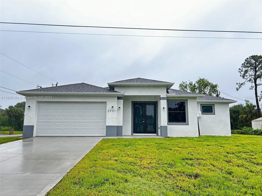 Discover your perfect home in this stunning new construction, a - Beach Home for sale in Lehigh Acres, Florida on Beachhouse.com