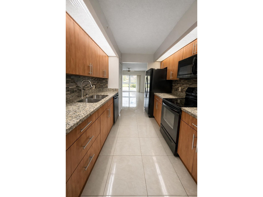 Perfectly convenient to the Pembroke Road gate with no long - Beach Condo for sale in Pembroke Pines, Florida on Beachhouse.com