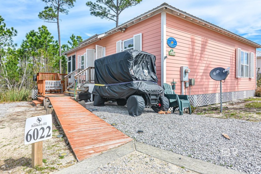 Welcome to this charming 3-bedroom, 2-bathroom cottage nestled - Beach Home for sale in Gulf Shores, Alabama on Beachhouse.com