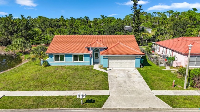 Beautifully updated waterfront home! This 3-bedroom, 2-bath, 1 - Beach Home for sale in Port Charlotte, Florida on Beachhouse.com