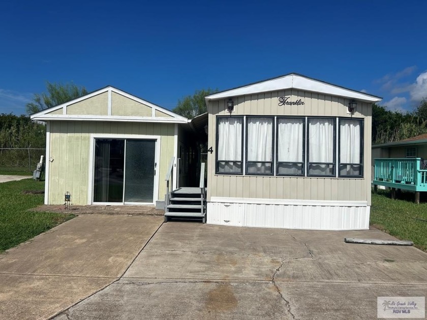 Discover comfort and community in this charming property - Beach Home for sale in Brownsville, Texas on Beachhouse.com