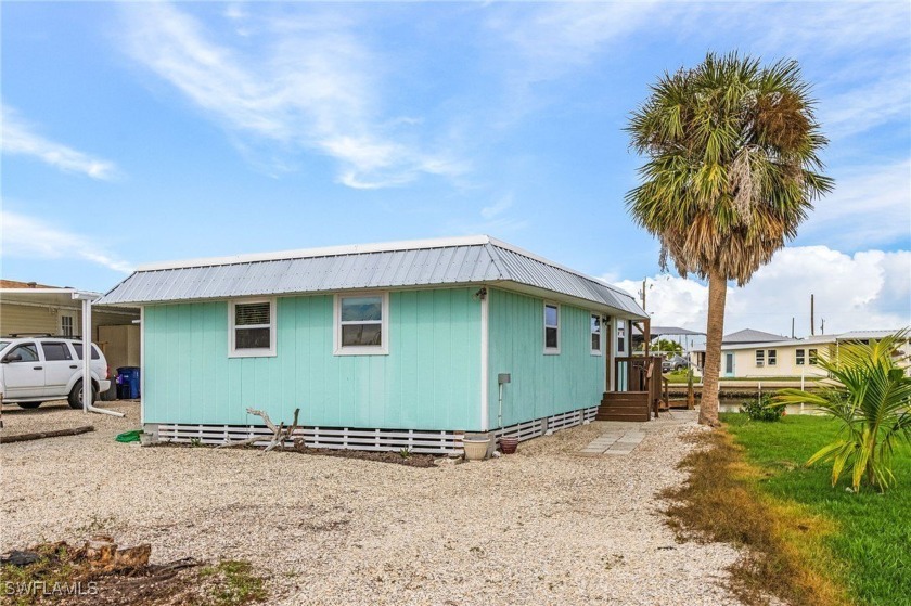 This lovely island cottage has everything you need.  NOT a - Beach Home for sale in ST. James City, Florida on Beachhouse.com