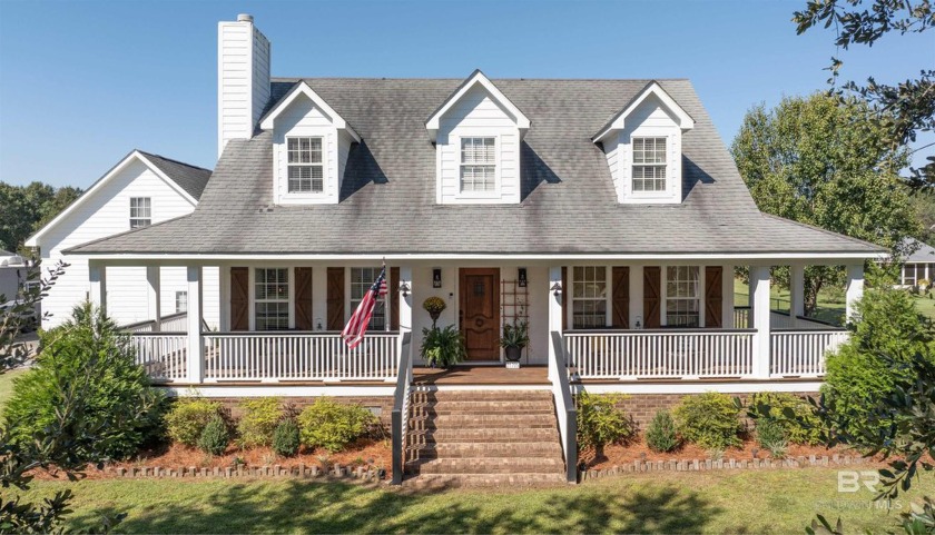 This Southern Charm home with a wrap around porch sits on almost - Beach Home for sale in Silverhill, Alabama on Beachhouse.com