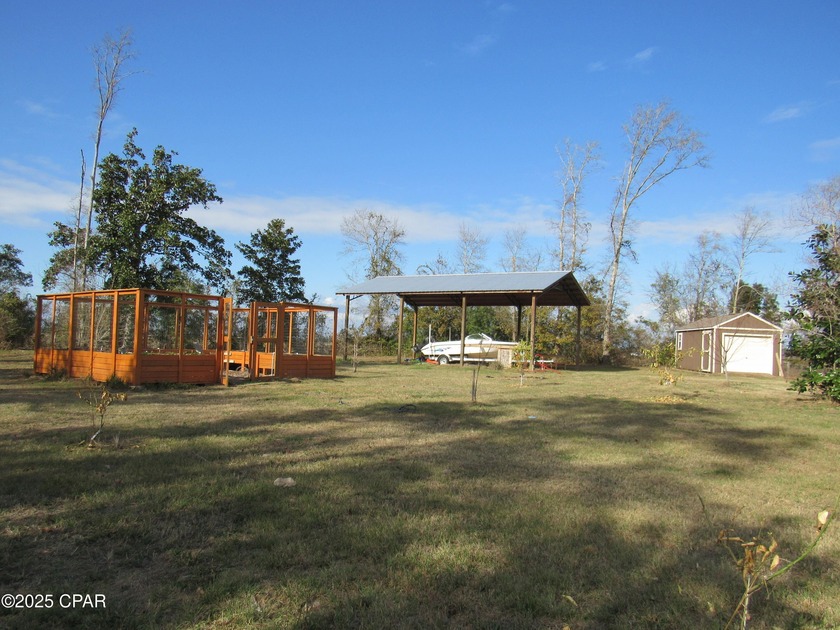 Gorgeous, manicured, and completely fenced over 3 acres! This - Beach Acreage for sale in Southport, Florida on Beachhouse.com