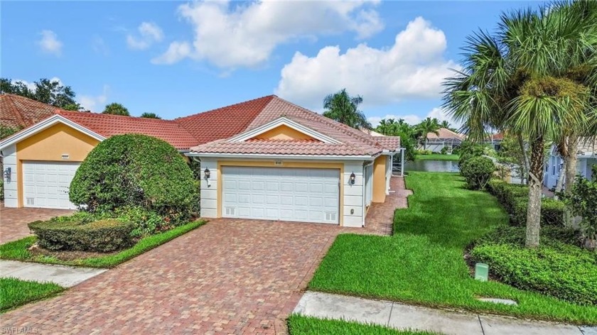 Located in the superb gated community Verona Walk - This popular - Beach Home for sale in Naples, Florida on Beachhouse.com