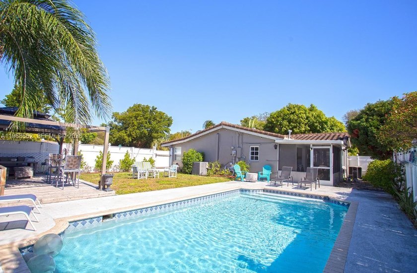 Beautifully updated 3-bedroom, 2-bath corner pool home in - Beach Home for sale in Pompano Beach, Florida on Beachhouse.com