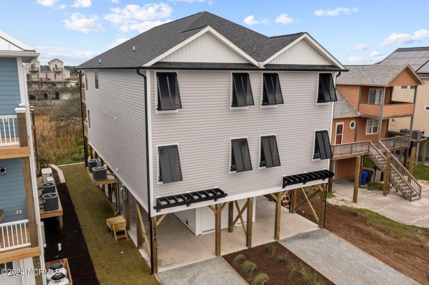 Beautiful NEW CONSTRUCTION beach home that is FURNISHED! This - Beach Townhome/Townhouse for sale in Surf City, North Carolina on Beachhouse.com