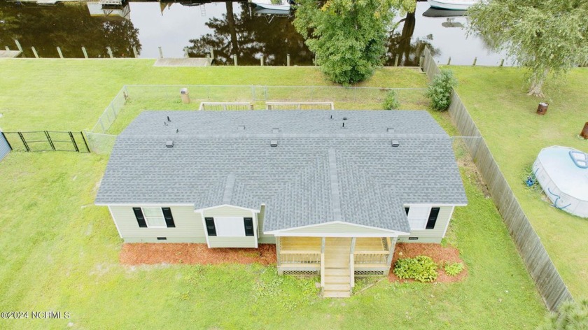 Are you a water enthusiast? This stunning canal-front property - Beach Home for sale in Moyock, North Carolina on Beachhouse.com