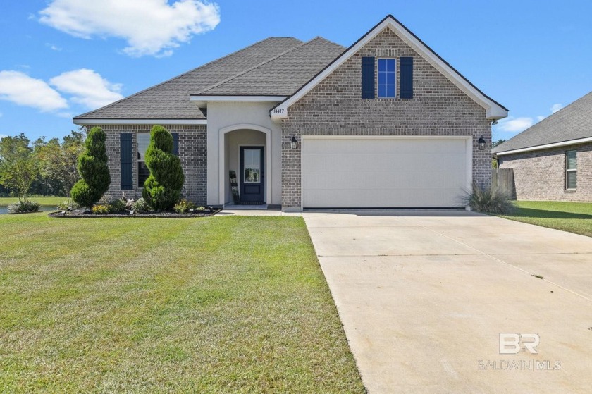 Welcome to your dream home, nestled on a prime lot by the pond - Beach Home for sale in Silverhill, Alabama on Beachhouse.com