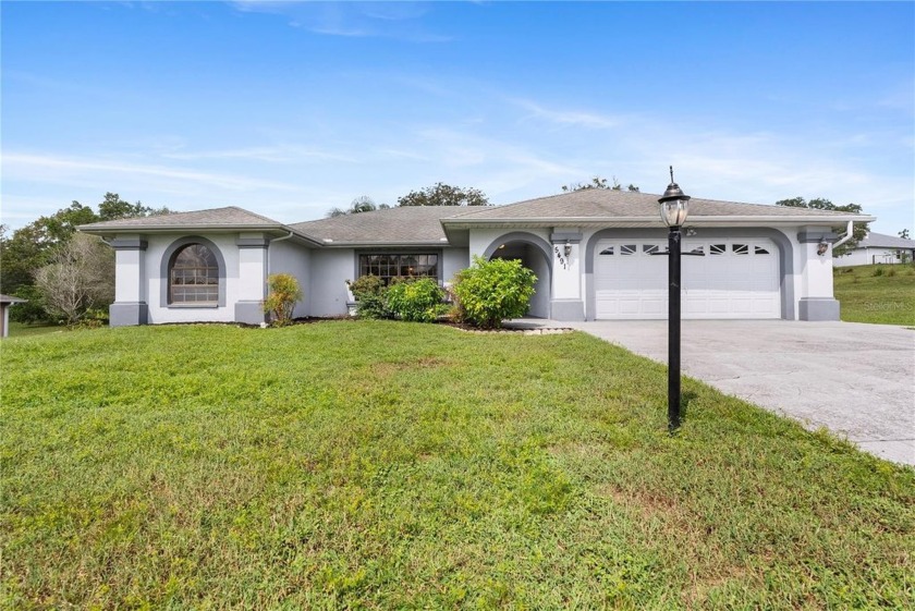 WOW!!! This exquisite pool home is a MUST SEE! NO CDD FEES! NO - Beach Home for sale in Spring Hill, Florida on Beachhouse.com