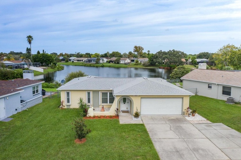 RARE PORT RICHEY WATERFRONT OPPORTUNITY! Very Nicely Kept and - Beach Home for sale in Port Richey, Florida on Beachhouse.com