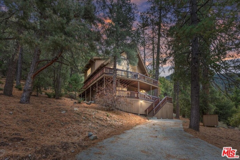 Perched perfectly in the pines atop an oversized flag lot, this - Beach Home for sale in Pine Mountain Club, California on Beachhouse.com