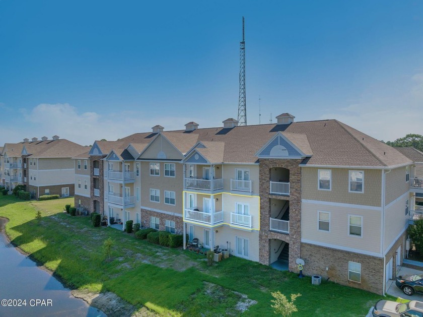 2 Bedroom/ 2 bathroom FURNISHED, pond view unit WITH garage in - Beach Condo for sale in Panama City Beach, Florida on Beachhouse.com