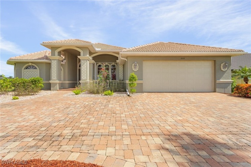 Experience waterfront living at its finest with this exquisite - Beach Home for sale in Cape Coral, Florida on Beachhouse.com