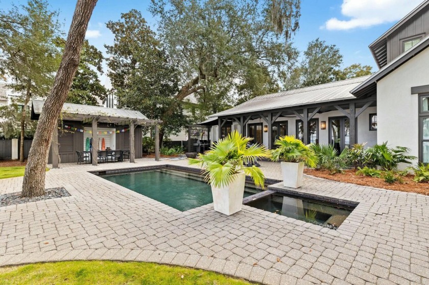 Discover unparalleled waterfront living in this stunning Bay - Beach Home for sale in Santa Rosa Beach, Florida on Beachhouse.com