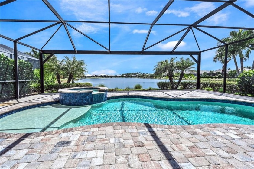 Outstanding long lake view from your beautifully screened-in - Beach Home for sale in Naples, Florida on Beachhouse.com