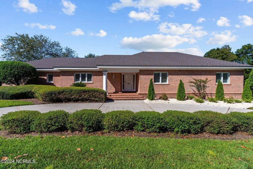 Welcome home to prestigious Landfall and this fully upgraded - Beach Home for sale in Wilmington, North Carolina on Beachhouse.com