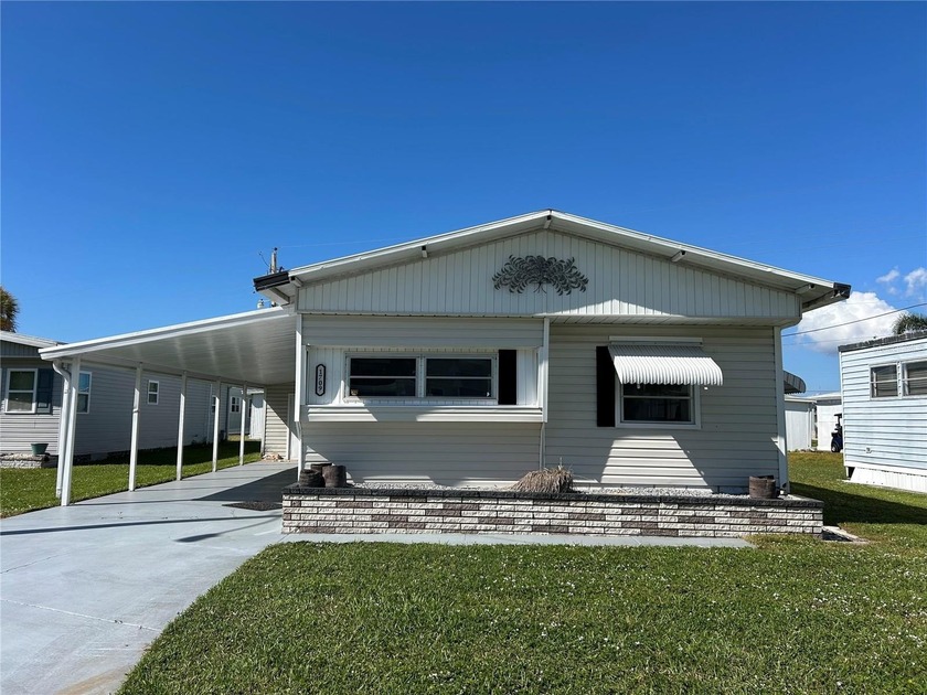**Charming Double Wide Home & Great value opportunity with this - Beach Home for sale in Sarasota, Florida on Beachhouse.com