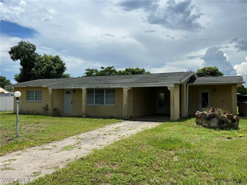 Great Opportunity To Make This Central Lehigh Acres Pool Home - Beach Home for sale in Lehigh Acres, Florida on Beachhouse.com