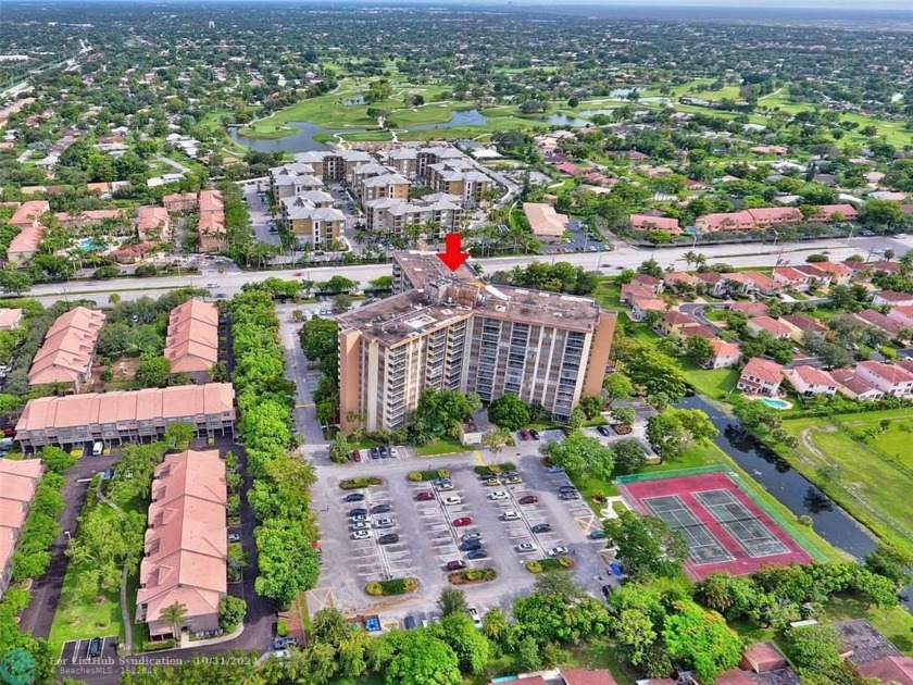 Experience upscale living in this exclusive fourth-floor unit at - Beach Condo for sale in Coral Springs, Florida on Beachhouse.com