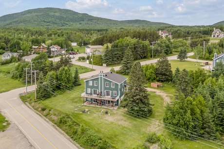 This property is divided into 4 condos and can accommodate a - Beach Home for sale in Petite-Rivière-Saint-FrançOis,  on Beachhouse.com