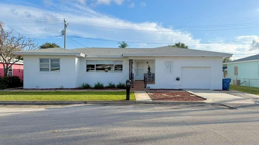 Welcome to your move-in ready coastal retreat! This beautifully - Beach Home for sale in Riviera Beach, Florida on Beachhouse.com