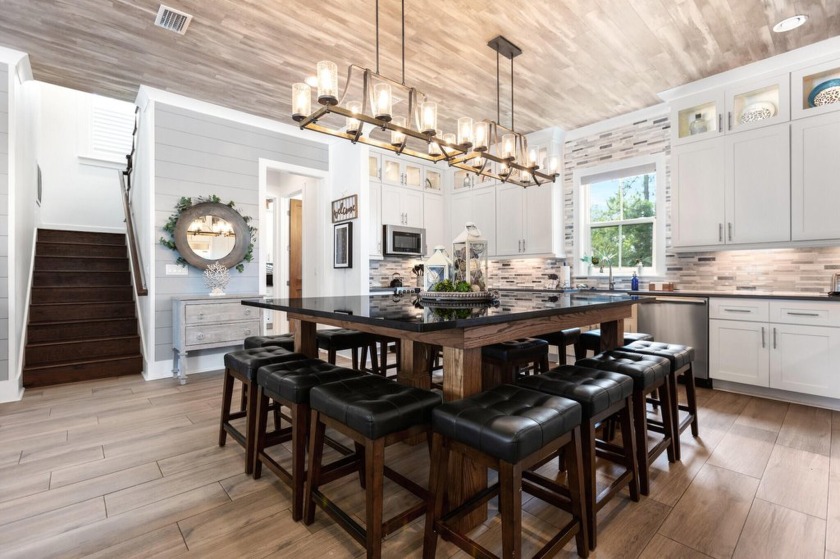 Experience coastal luxury and turnkey profitability with this 5 - Beach Home for sale in Miramar Beach, Florida on Beachhouse.com