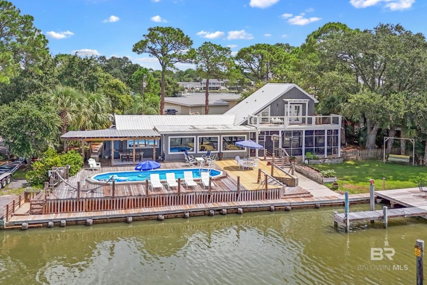 Welcome to paradise! This secluded Buchanan Bay home is meant - Beach Home for sale in Dauphin Island, Alabama on Beachhouse.com