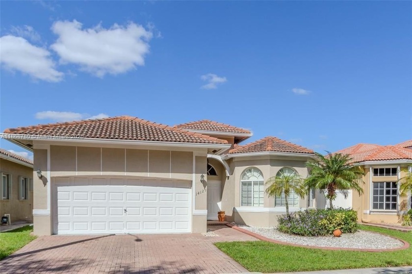 Experience the best of lakefront living in this beautiful - Beach Home for sale in Miramar, Florida on Beachhouse.com