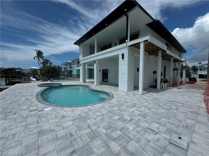 Welcome to your Dream Coastal retreat! This Newly ELEVATED Gulf - Beach Home for sale in Fort Myers Beach, Florida on Beachhouse.com