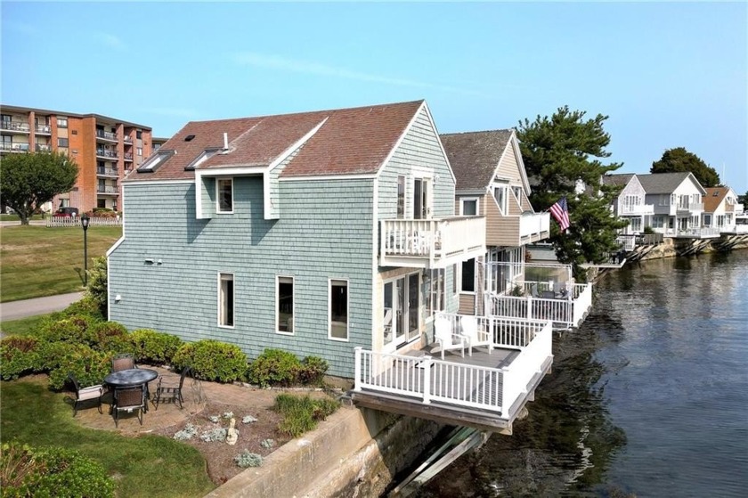 *Volunteer*, a waterfront cottage on Goat Island's Defenders Row - Beach Condo for sale in Newport, Rhode Island on Beachhouse.com