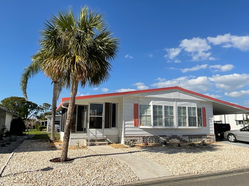 This delightful mobile home in Seabreeze Estates offers not only - Beach Home for sale in Bradenton, Florida on Beachhouse.com